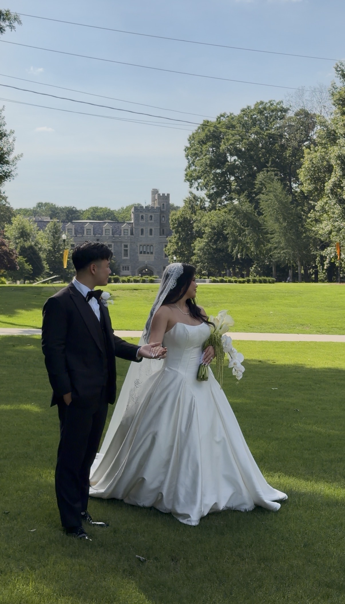Candid wedding moment captured by Moments Media Co.